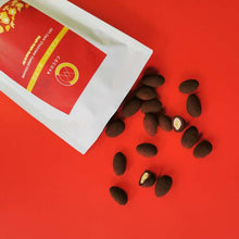 Load image into Gallery viewer, COCOVA Wacky Almonds 68% Dark Chocolate Coated Almonds (130g) - Thehivebulkfoods